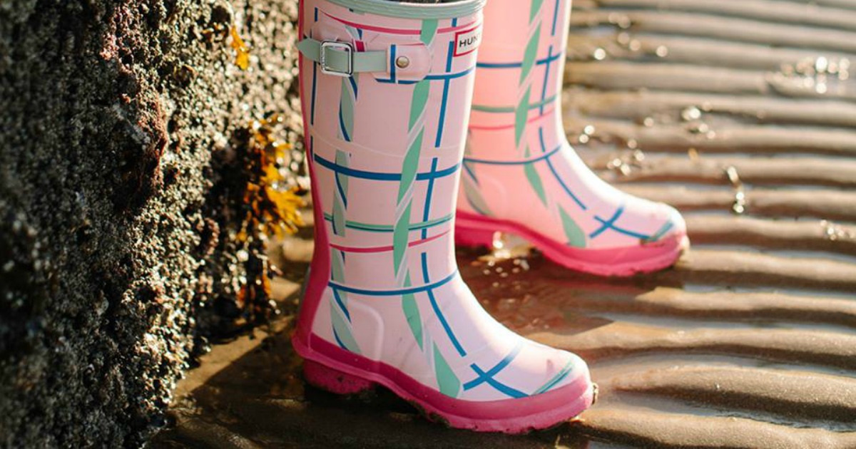 womens hunter boots on watery ground