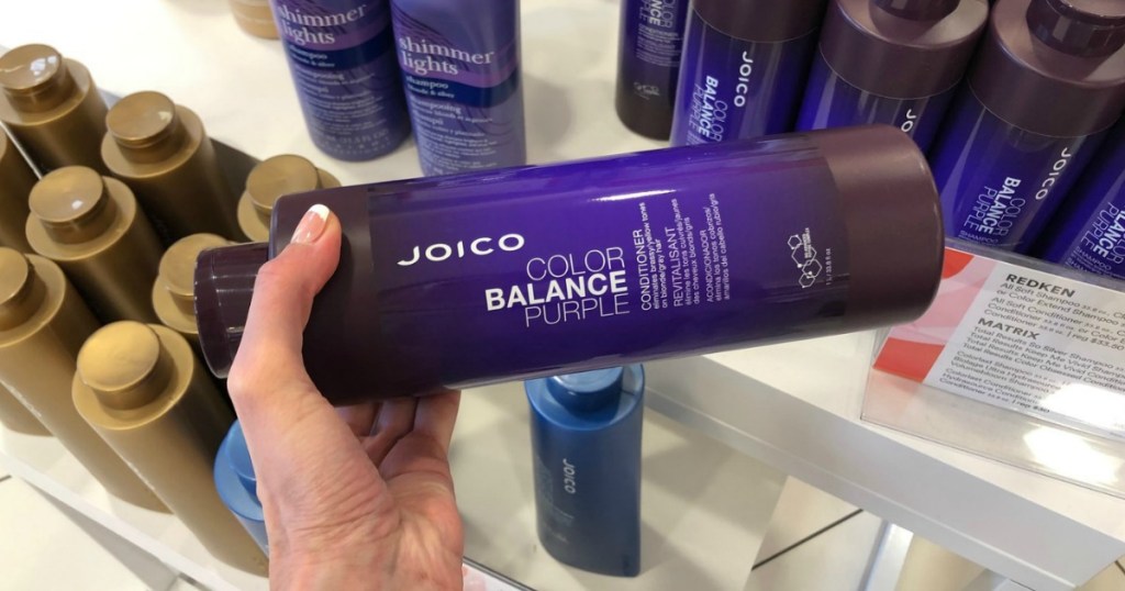 hand holding JOICO Color Balance Purple Shampoo