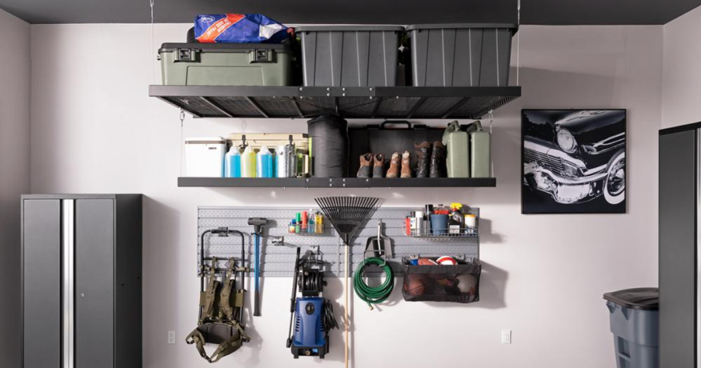 NewAge Pro Series Wall Mounted Steel Shelf Set in Black with boxes and garage items on wall in garage