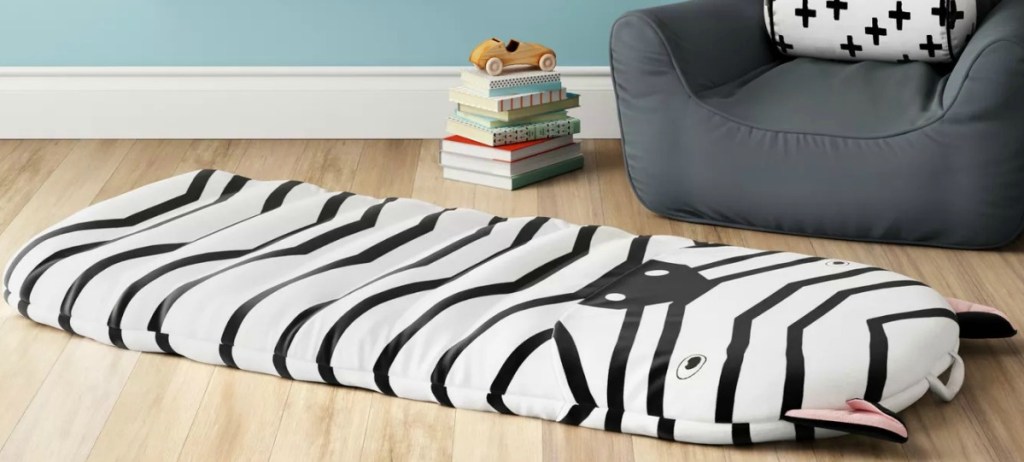 Zebra themed kids bed mat on the wooden floor