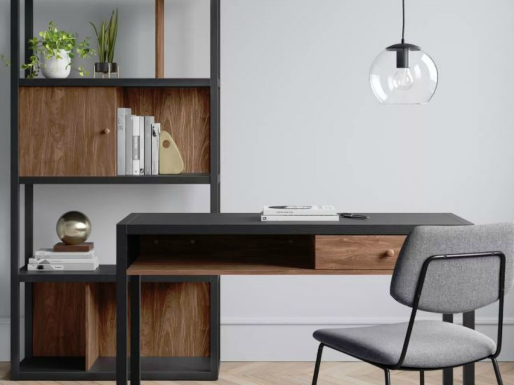 room with desk, bookshelf and chair