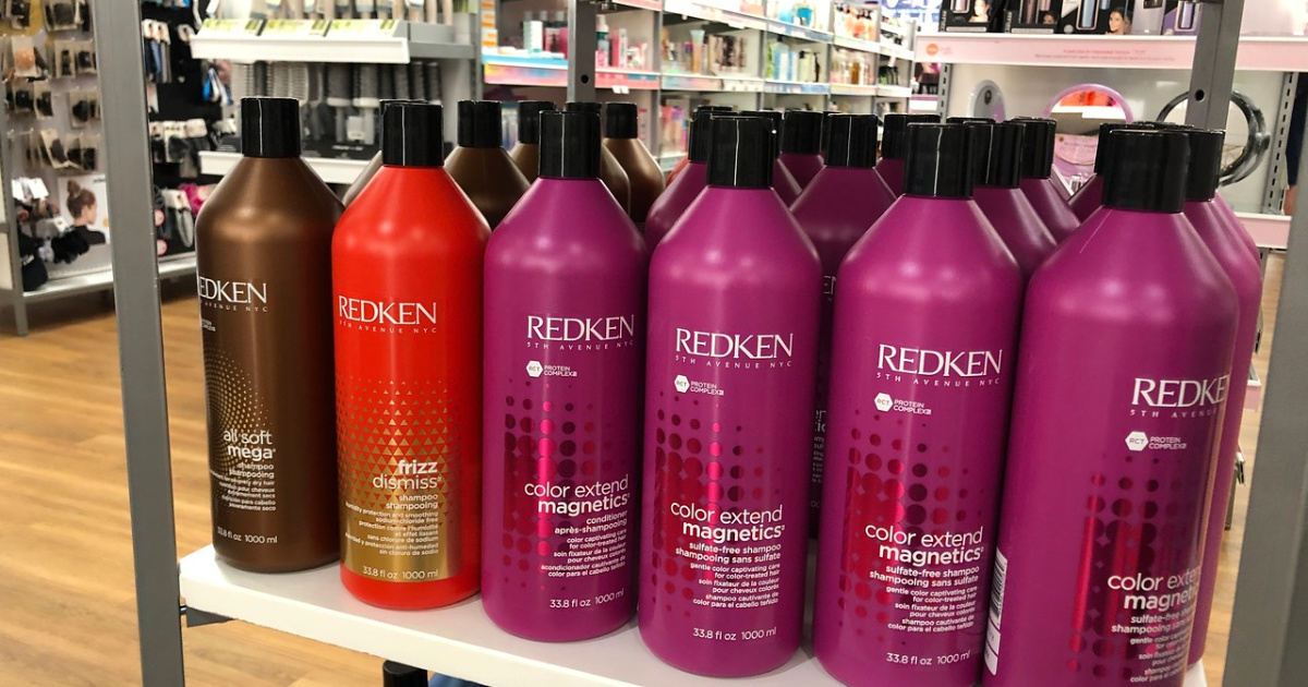 jumbo bottles of redken hair care on an ulta shelf