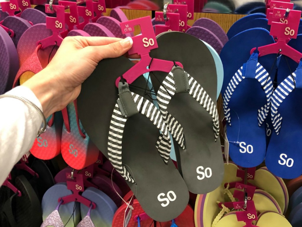 Patterned Black and blue sandals in store display