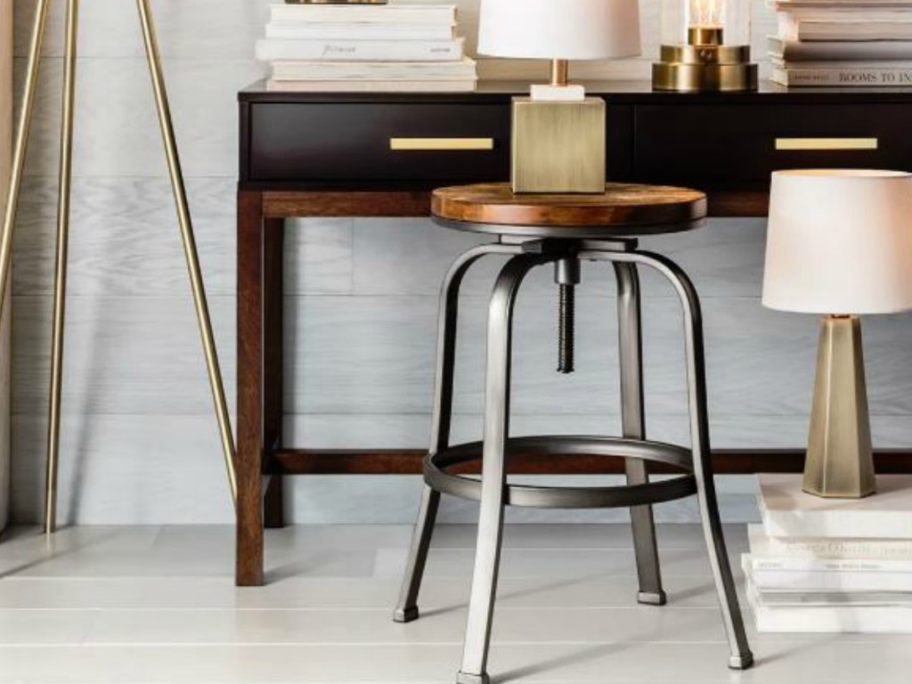 stool with lamp on it near a desk