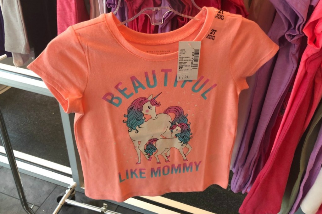 unicorn-themed coral colored toddler's graphic tee in store