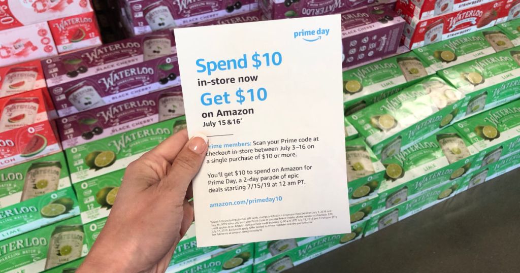 hand holding Whole Foods Prime Day Flyer in store