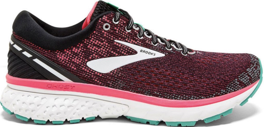 Women's running shoe in pink and black with a teal sole