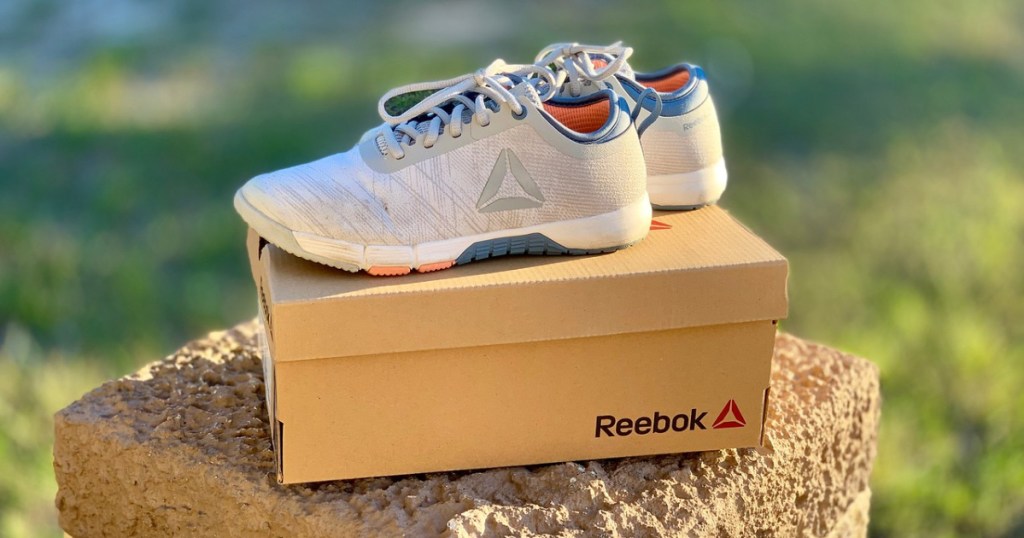 womens reebok shoes on top of shoebox