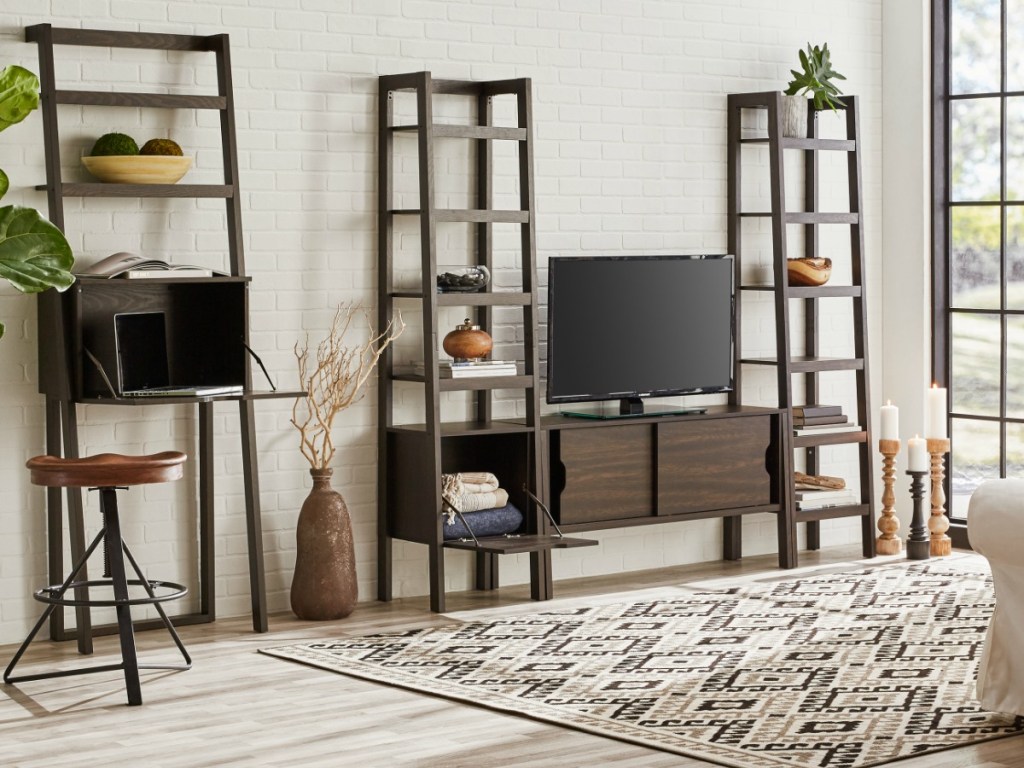 livingroom with brown furniture and a carpet