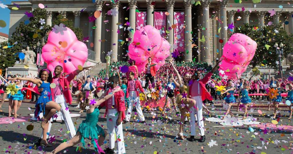 colorful display of balloons and ribbons at outdoor festival