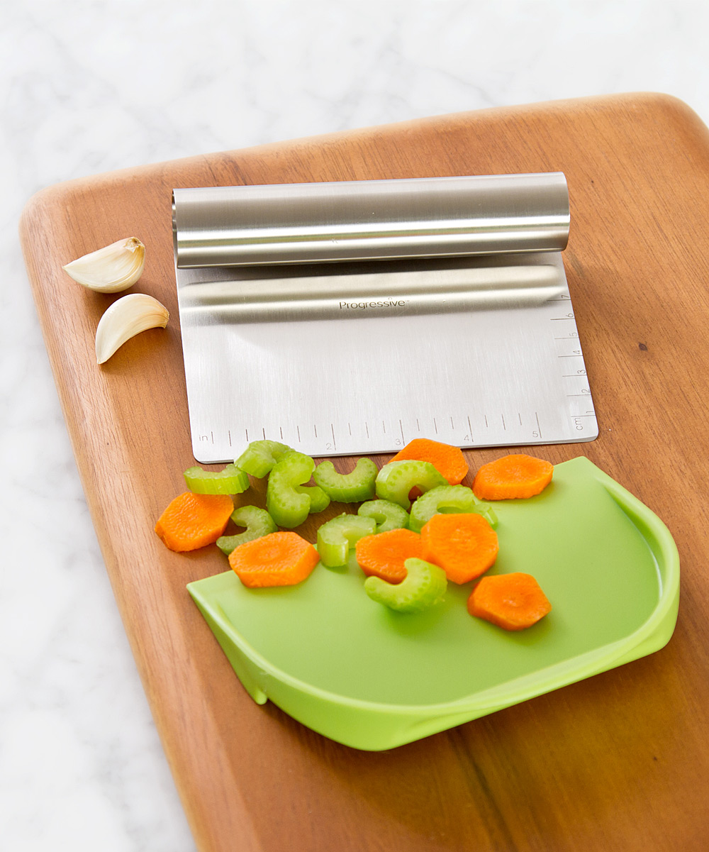 chop tool on cutting board with veggies