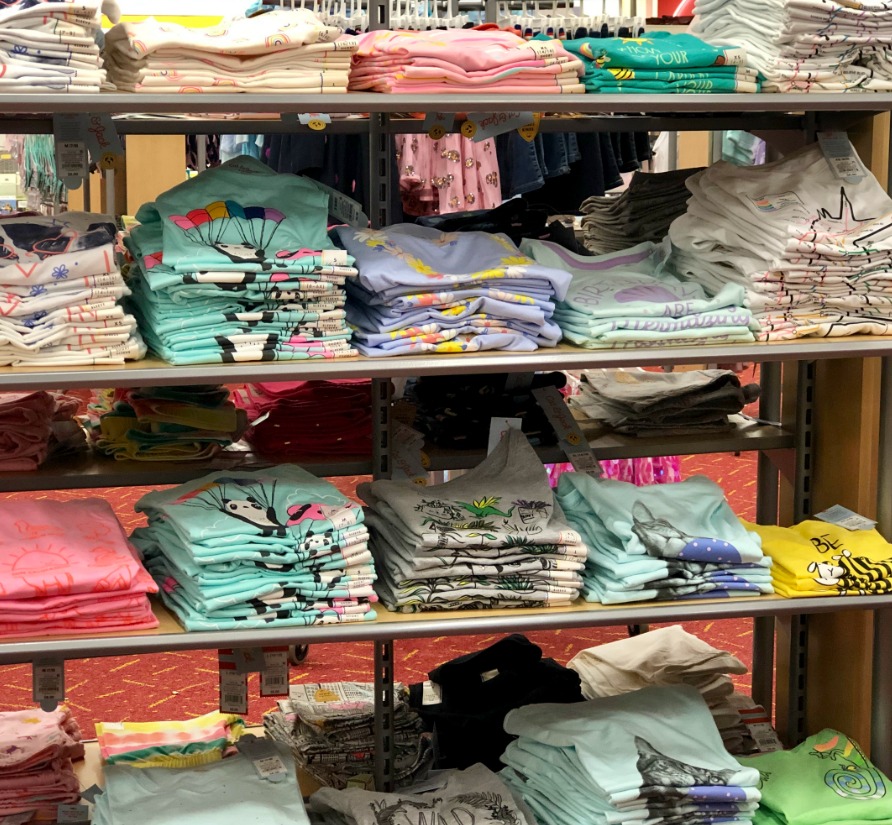 shelf full of girls graphic tees