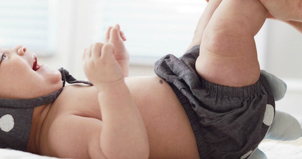 baby laying on its back