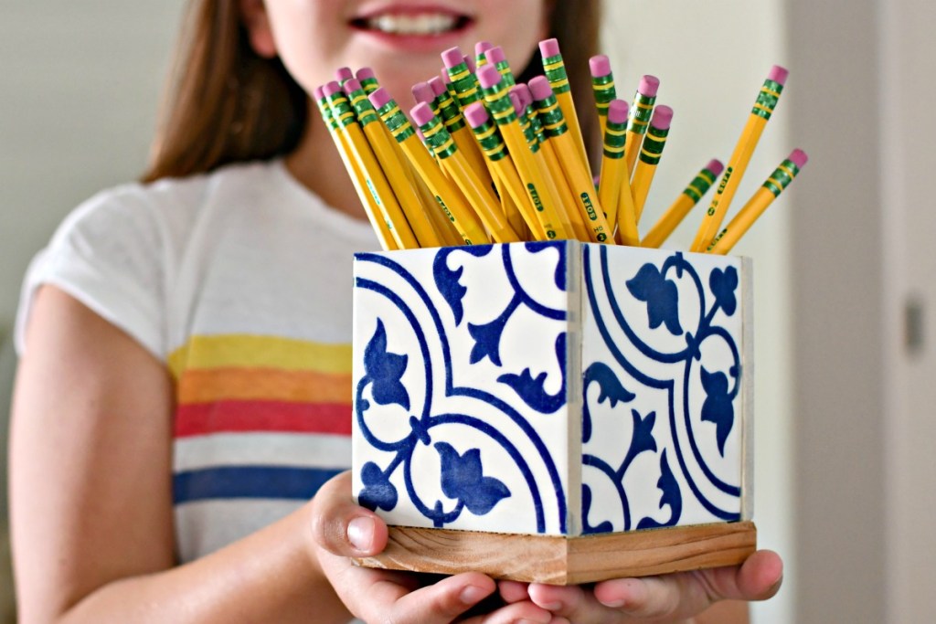 holding a diy teachers gift pencil holder