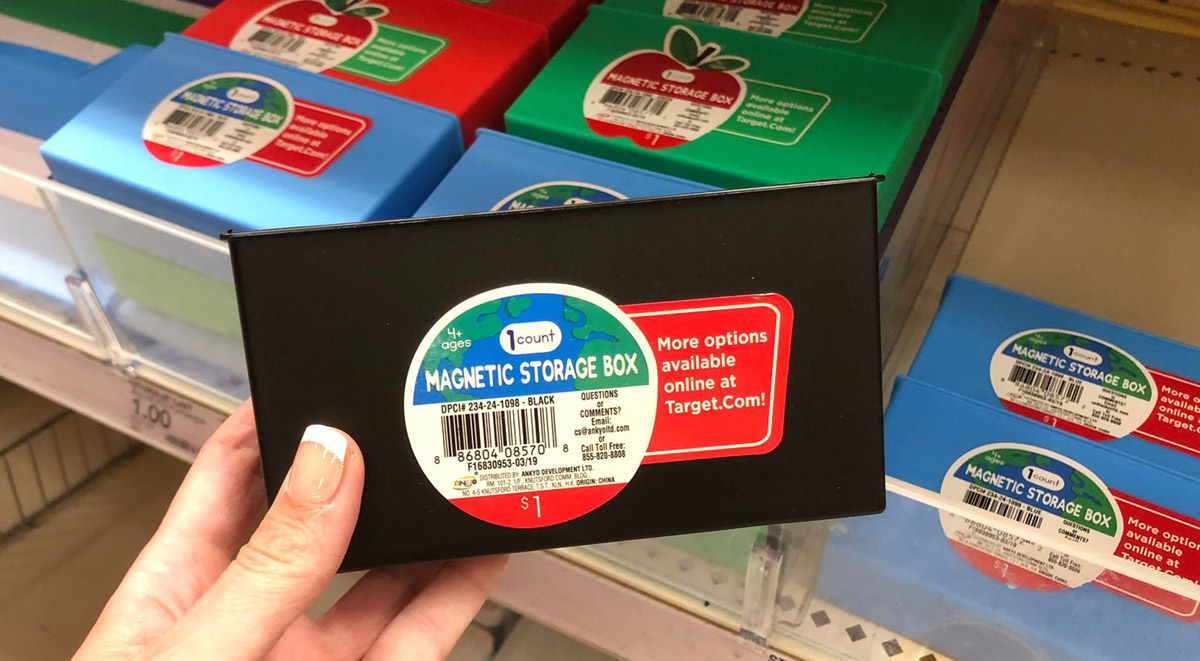 magnetic storage box being held in hand at store