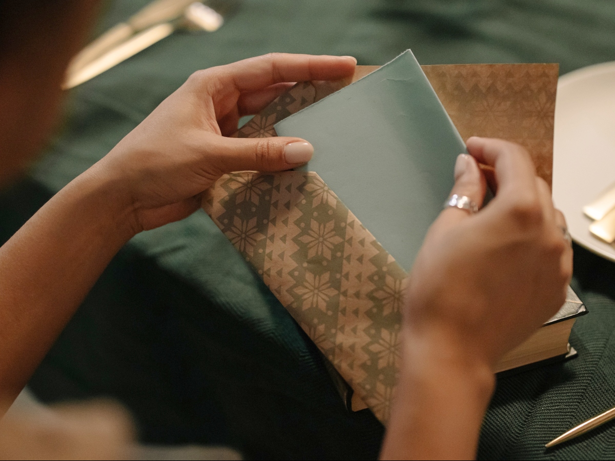 woman opening letter