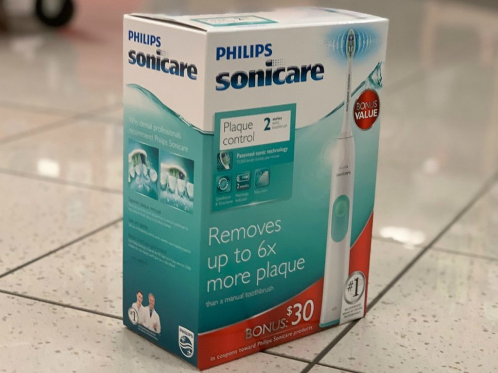 box with toothbrush on store floor