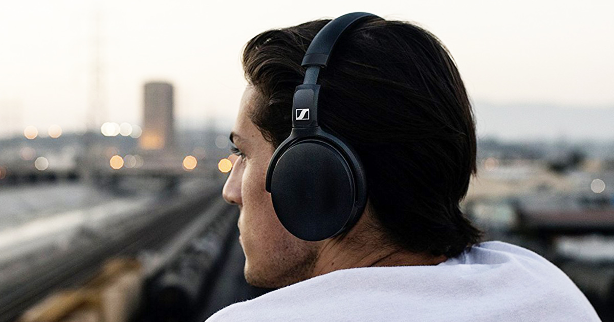 man wearing sennheiser headphones