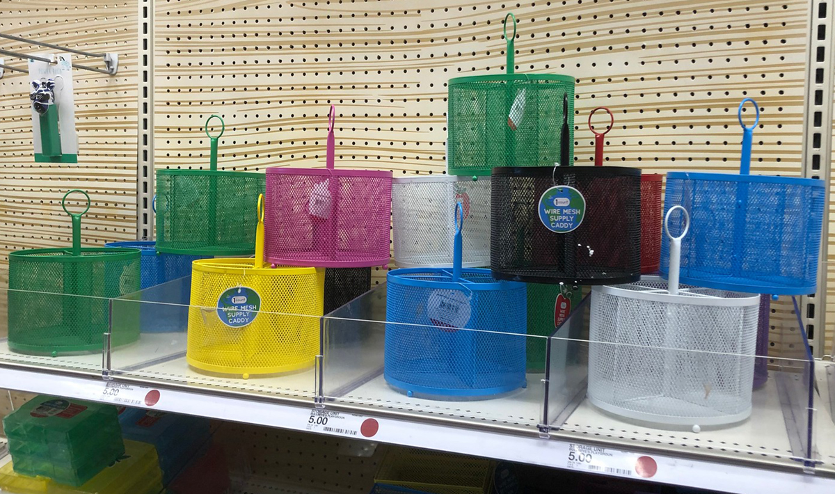 wire mesh supply caddies in various colors on a store shelf