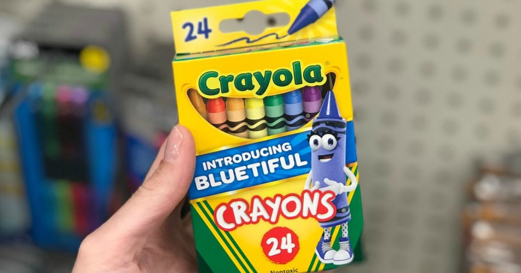 hand holding crayola crayons at target