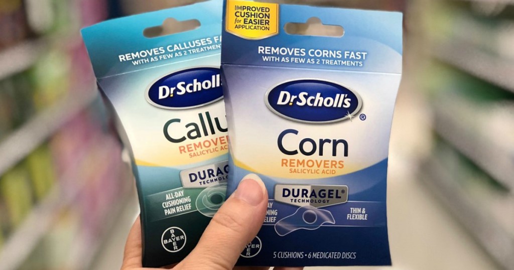 hand holding dr. scholl's duragel callus and corn removers at target