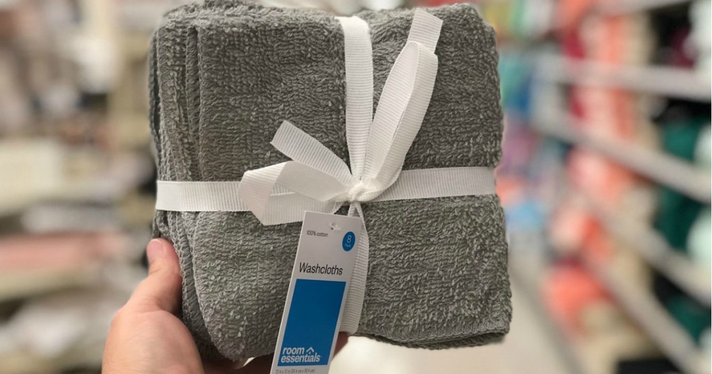 hand holding room essentials washcloths at target