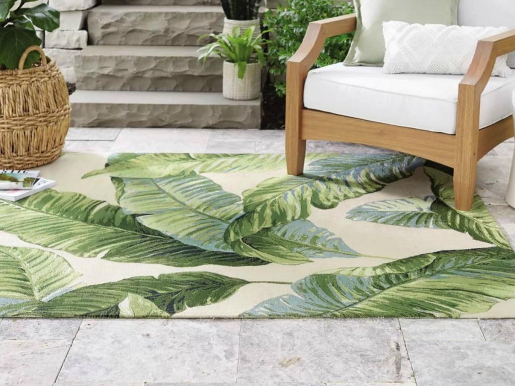 freen leaves rug outside with patio furniture