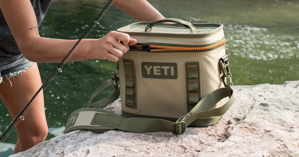 yeti hopper 8 soft side cooler near river