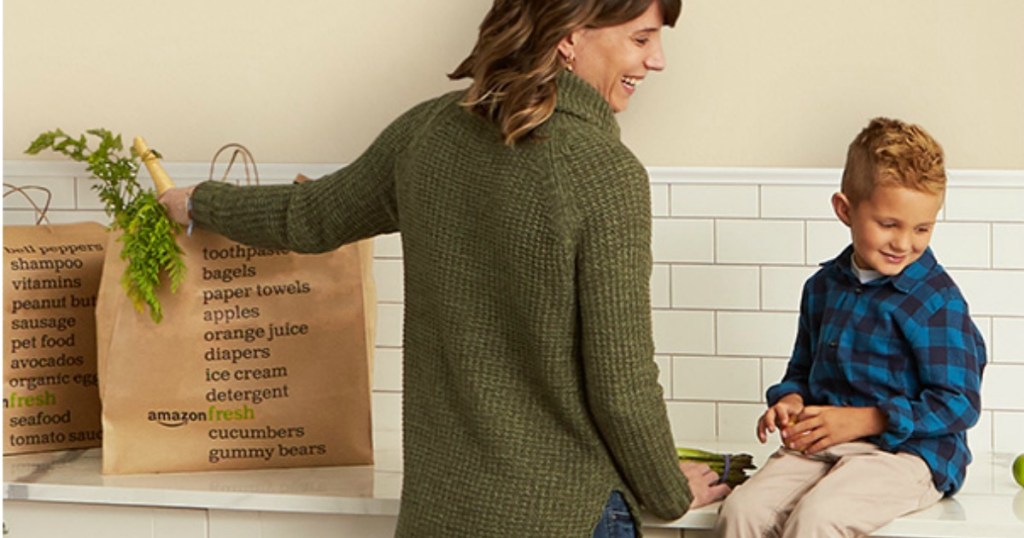 mother and child with Amazon Fresh bags