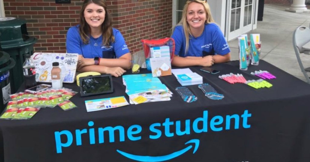 Two girls at a table on campus