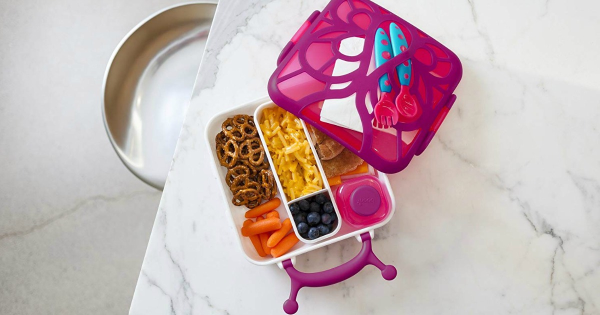 pink snail bento box with macaroni & cheese and veggies inside