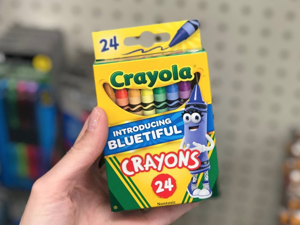 Hand holding Crayola Crayons 24 Pack