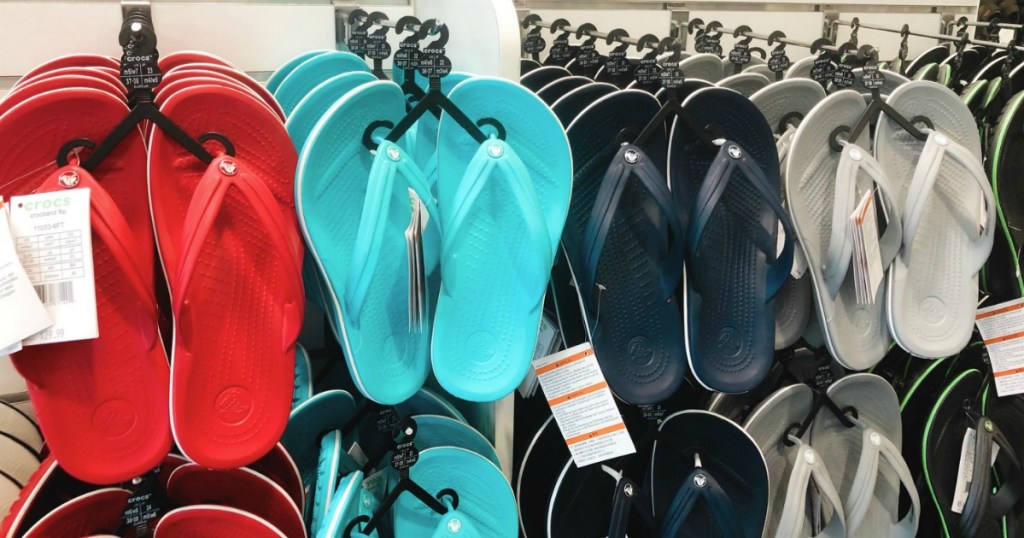 Styles of Crocs flip flops on stock rack