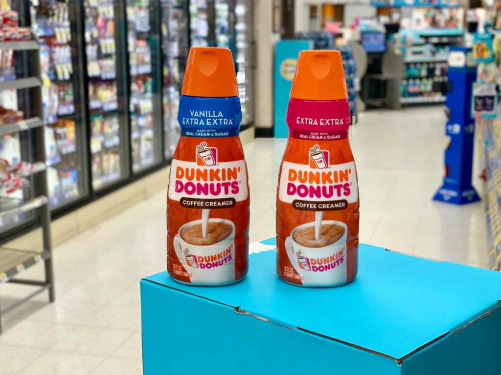 dunkin creamer sitting on box