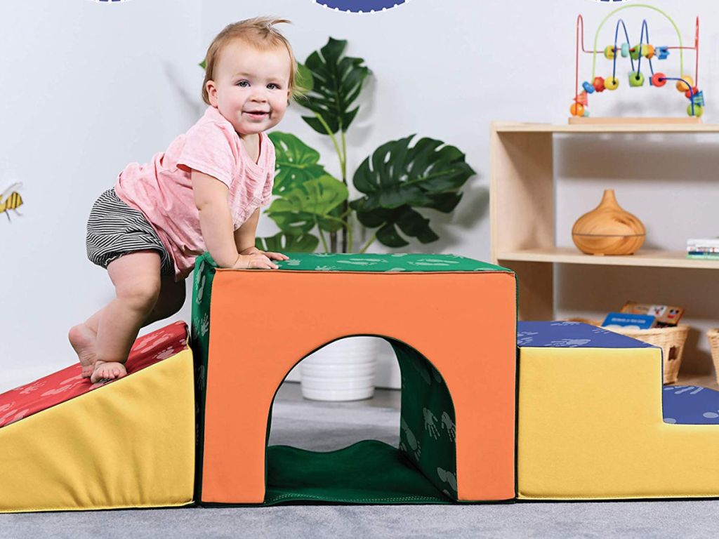 baby crawling on ECR4Kids SoftZone Single-Tunnel Foam Climber