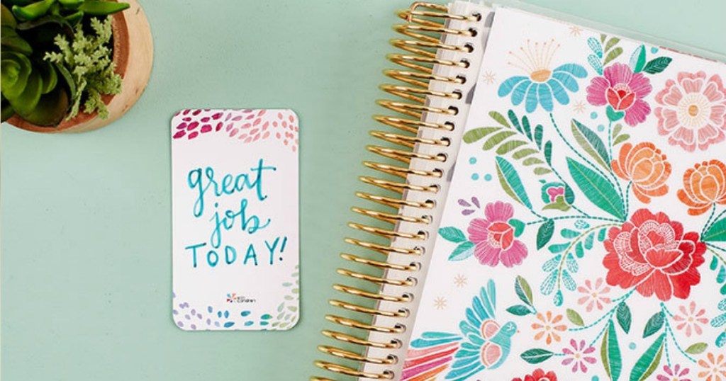 Erin Condren Compliment Card next to journal
