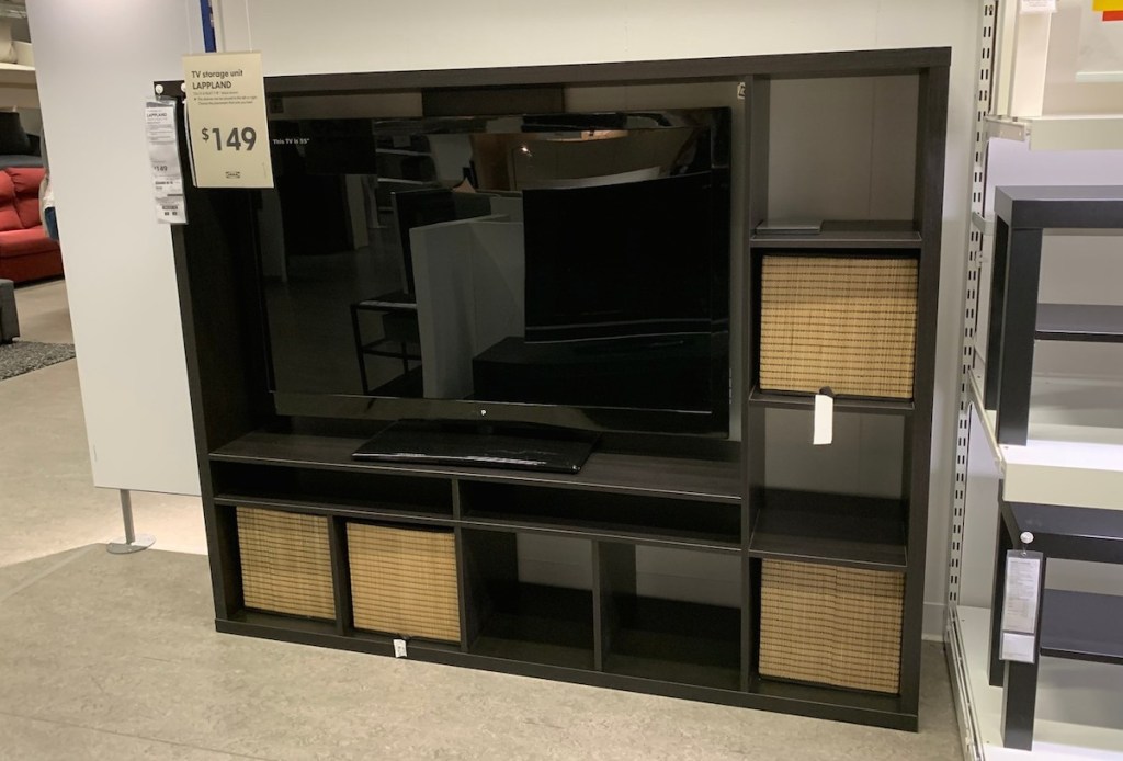 black tv storage unit with baskets in IKEA 