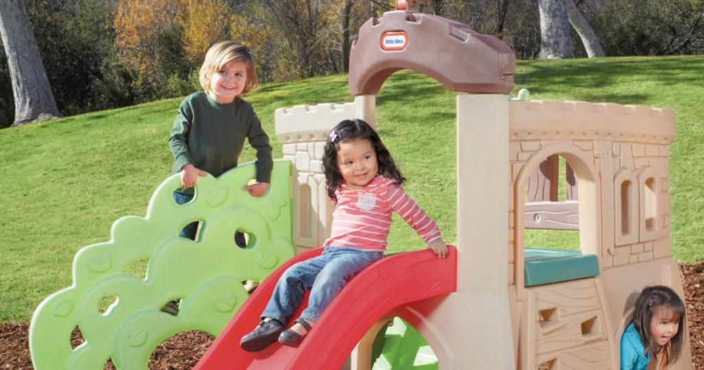 kids playng on a Little Tikes Rock Climber & Slide