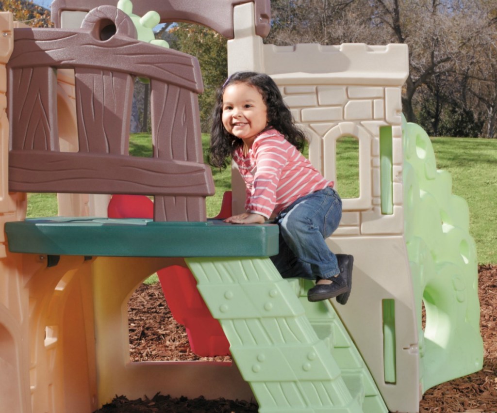 girl climbing Little Tikes Rock Climber and Slide