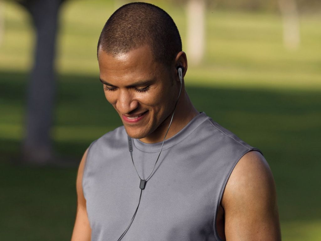 Man wearing black bose headphones