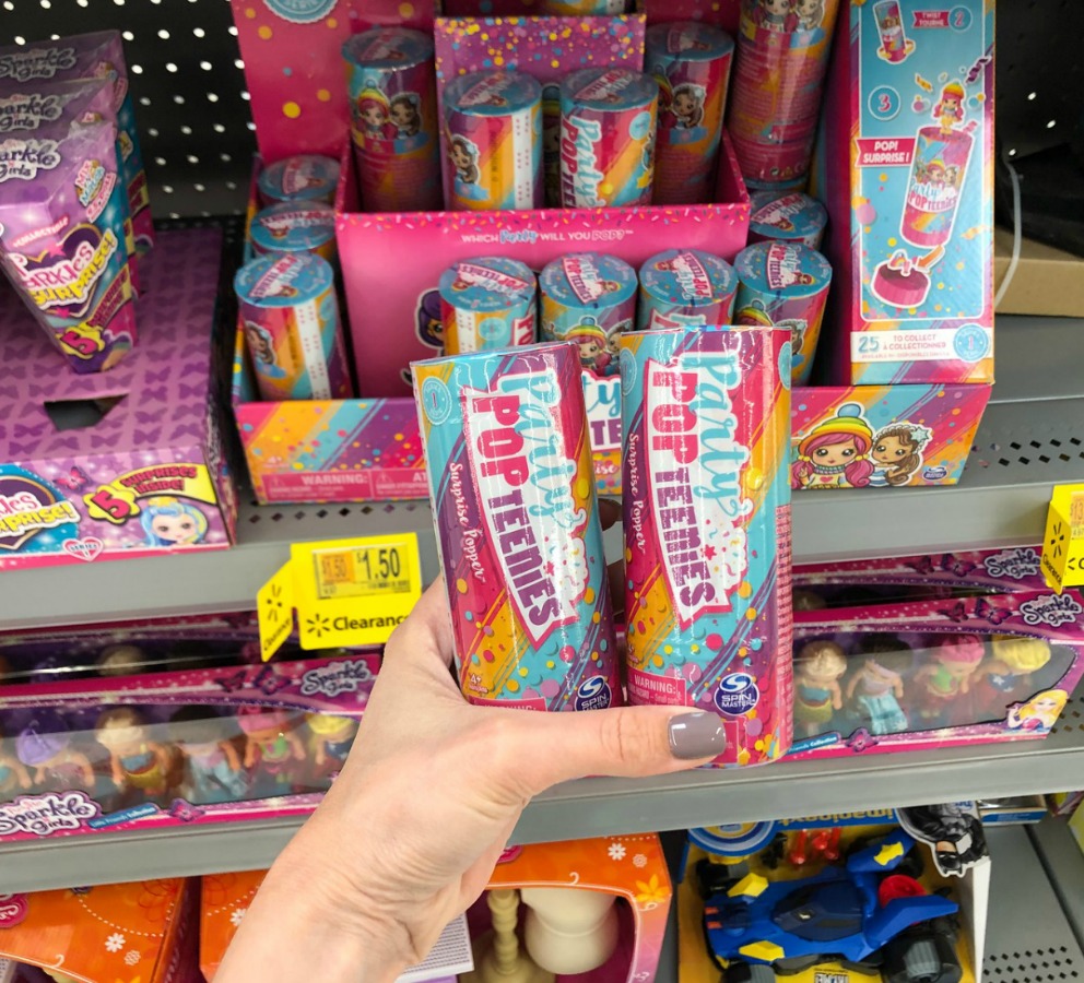 hand holding pop-teenies in store