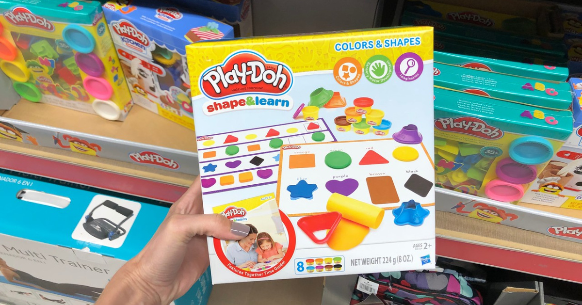 woman holding stem play-doh set at aldi