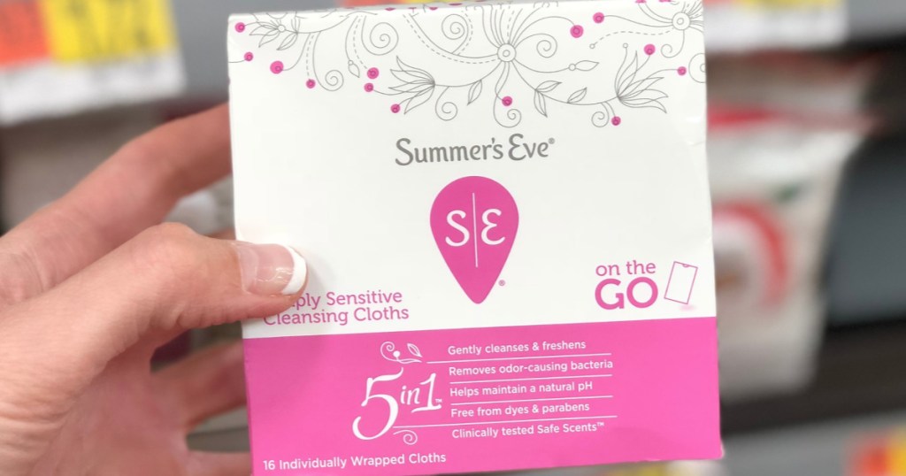 Hand holding Summer's Eve Cleansing Cloths