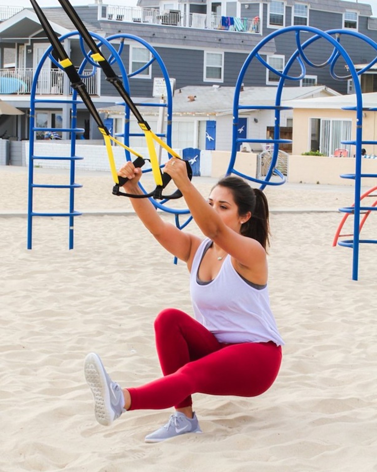 Woman using TRX Training Straps