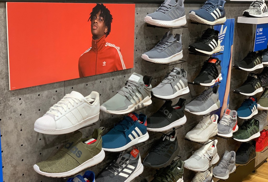 various types of adidas sneakers on display 