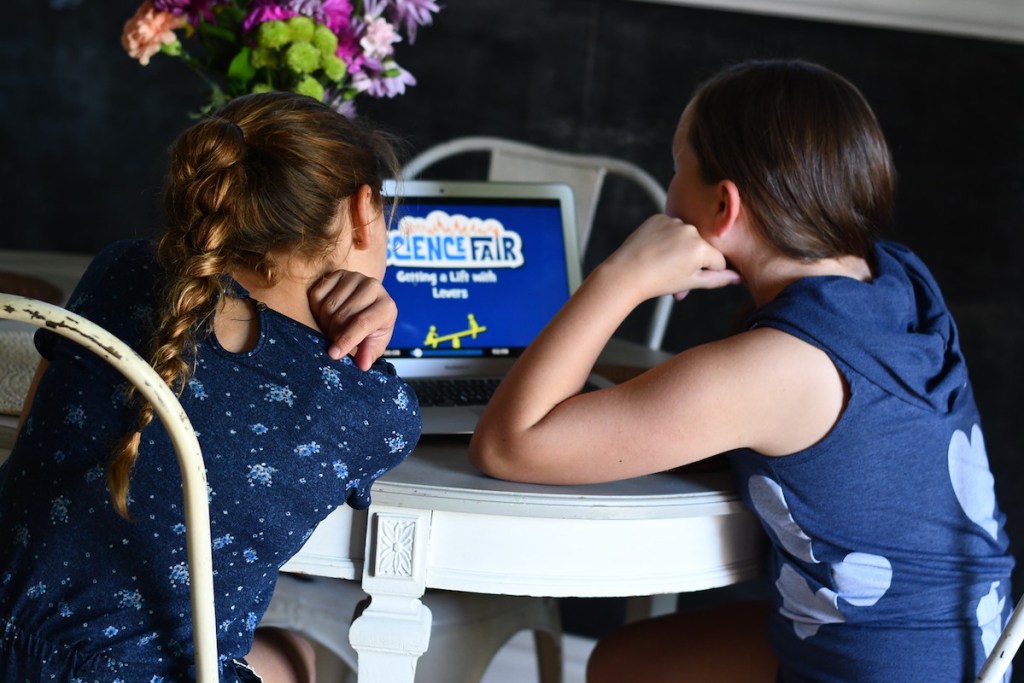 Adventure Academy Game being played by two girls