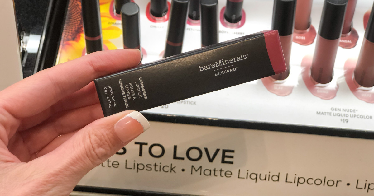hand holding Bare Minerals matte lipstick one of the birthday freebies on our list
