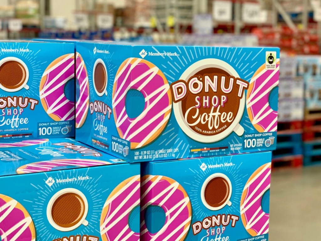 boxes of coffee in store with donut pictures on them