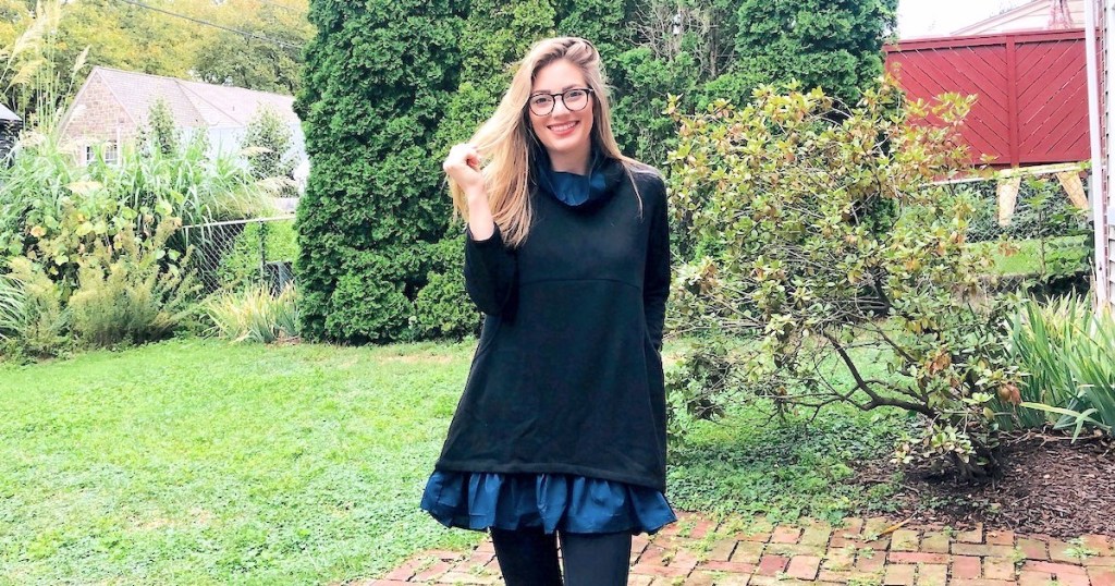 woman wearing cute fall black ruffle dress