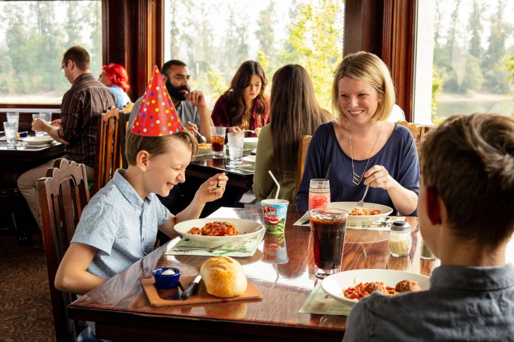 boy and family eating at The Old Spaghetti Factory